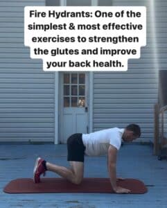 professional basketball player adam kemp doing the fire hydrant exercise